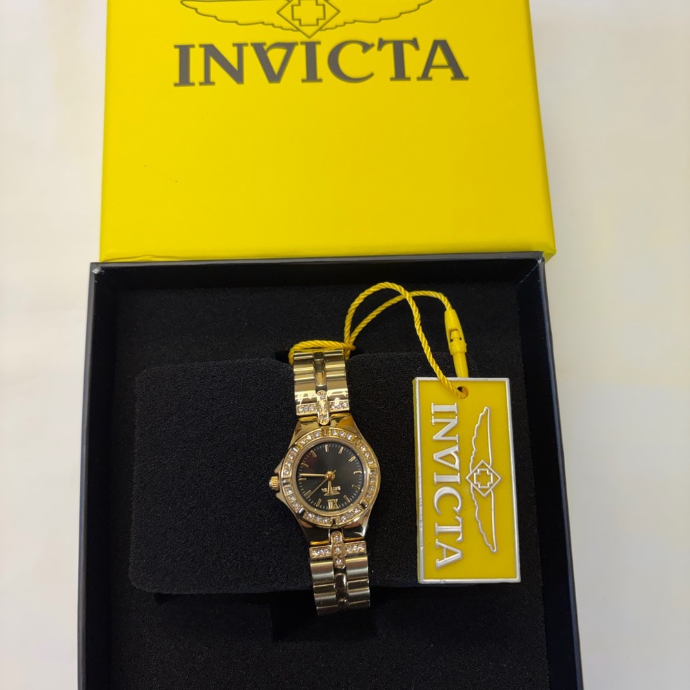 Invicta Gold and Black Timepiece